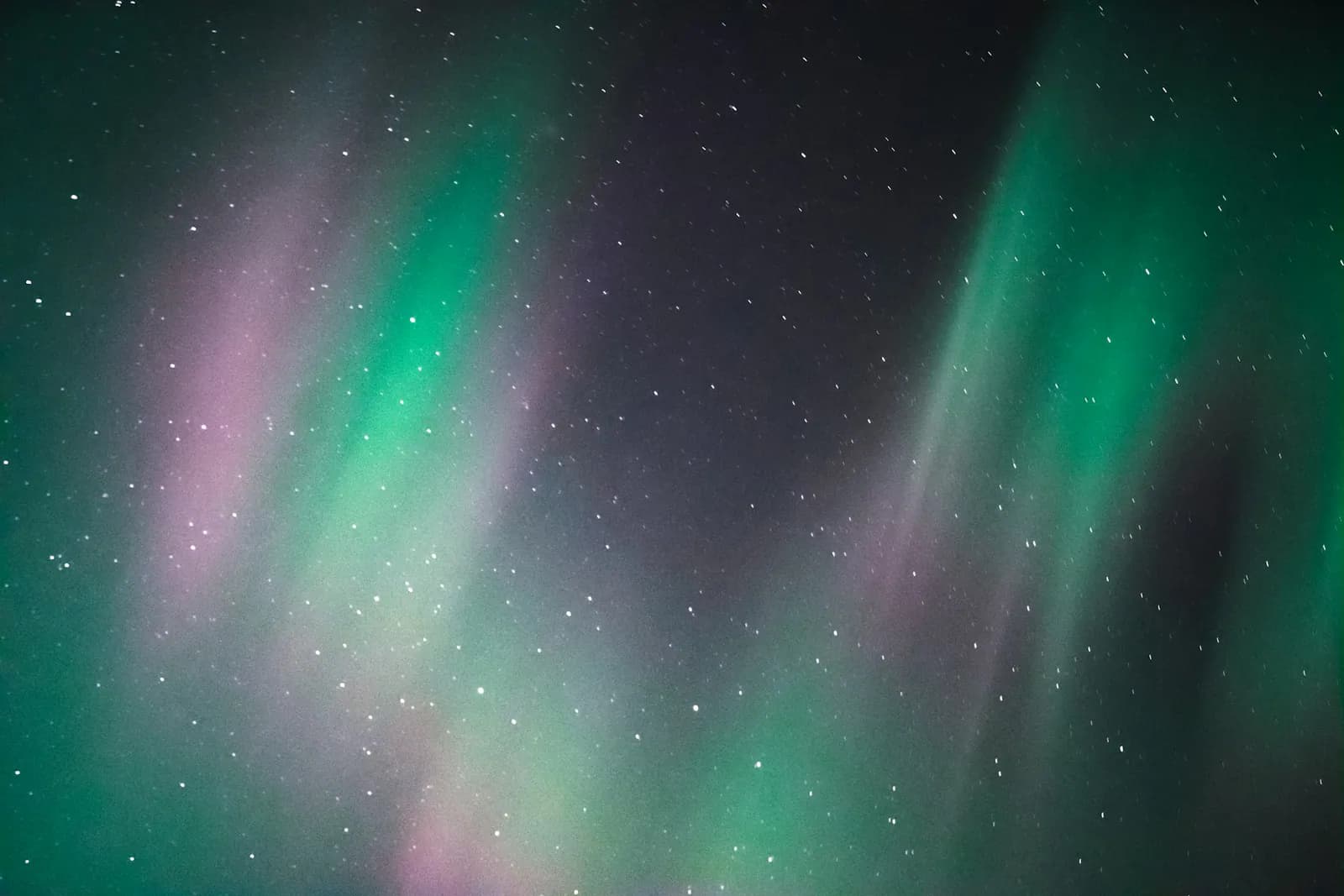 Aurora over a dark landscape